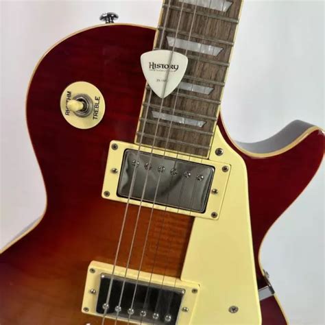 This is a Photo Genic Les Paul LP-300 that is in exc. . Paul cherry
